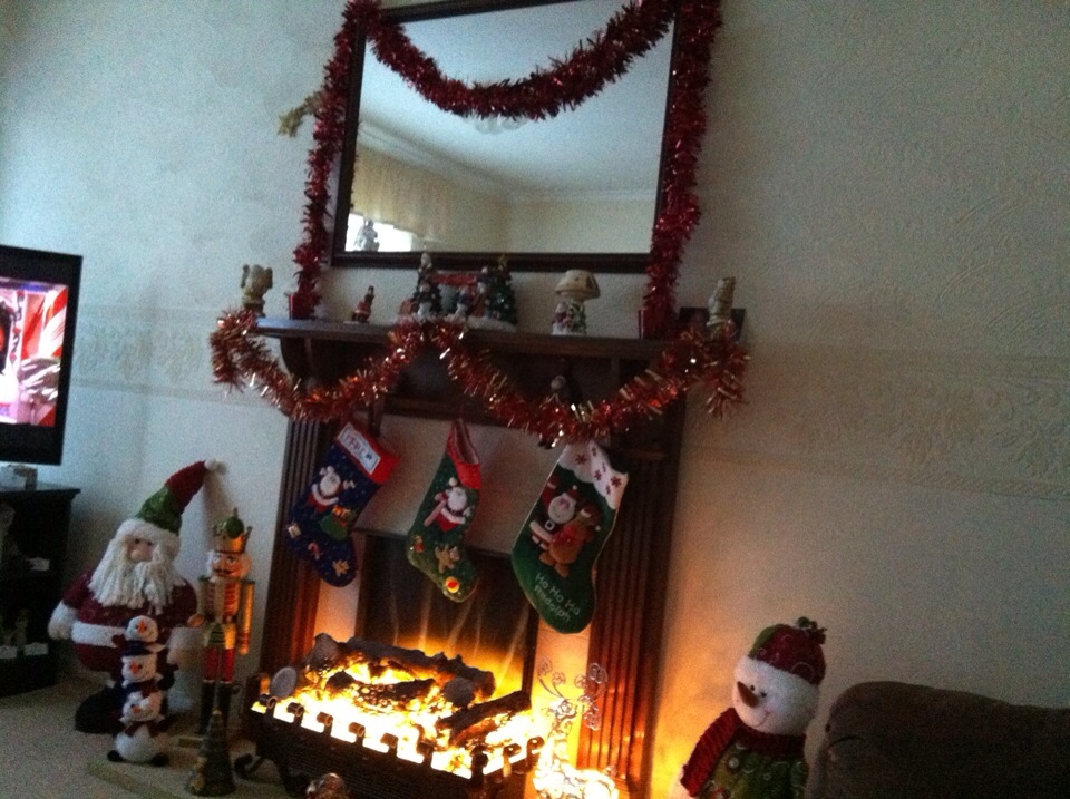 Stockings ready for Santa above the Griffiths family fireplace