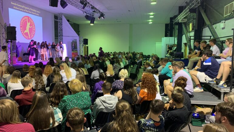 a room packed with young people