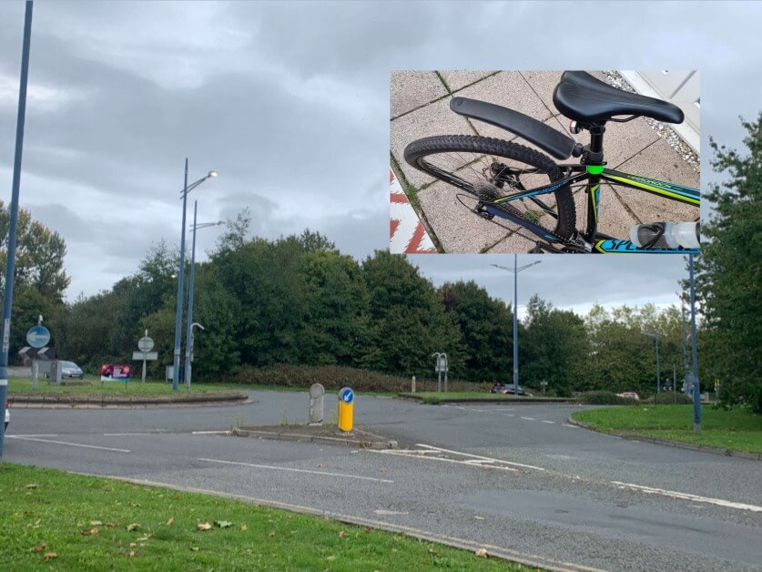 a roundabout and photo of damaged bike