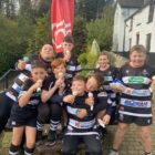 young rugby players enjoy an ice cream