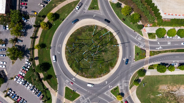 cars on a roundabout from above