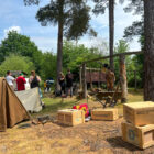 an army camp, tents and boxes at re-enactment event