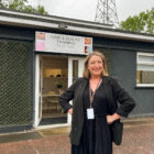 Emma Macmillan stood outside the entrance Mac-Ed Training Academy