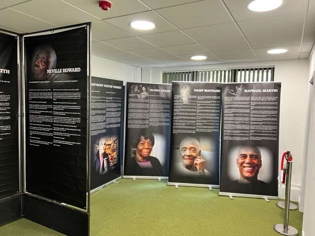 exhibition boards showing the Windrush story