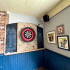 a dart board in a pub