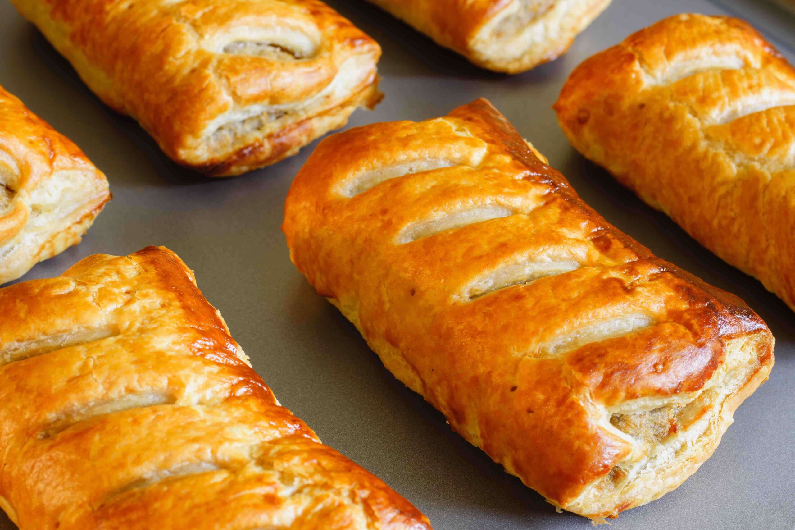 a tray of sausage rolls