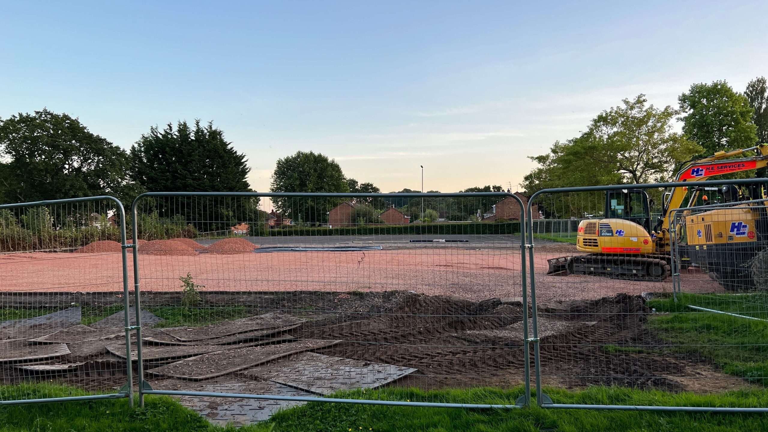 work taking place on tennis courts