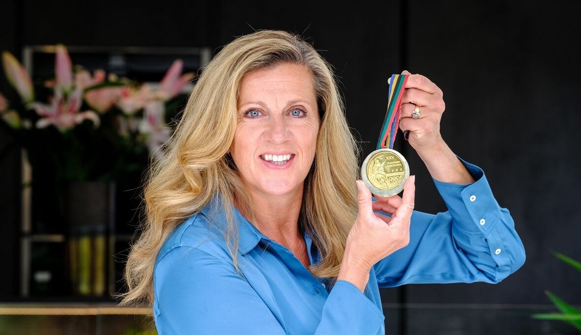 Sally Gunnell holds a medal
