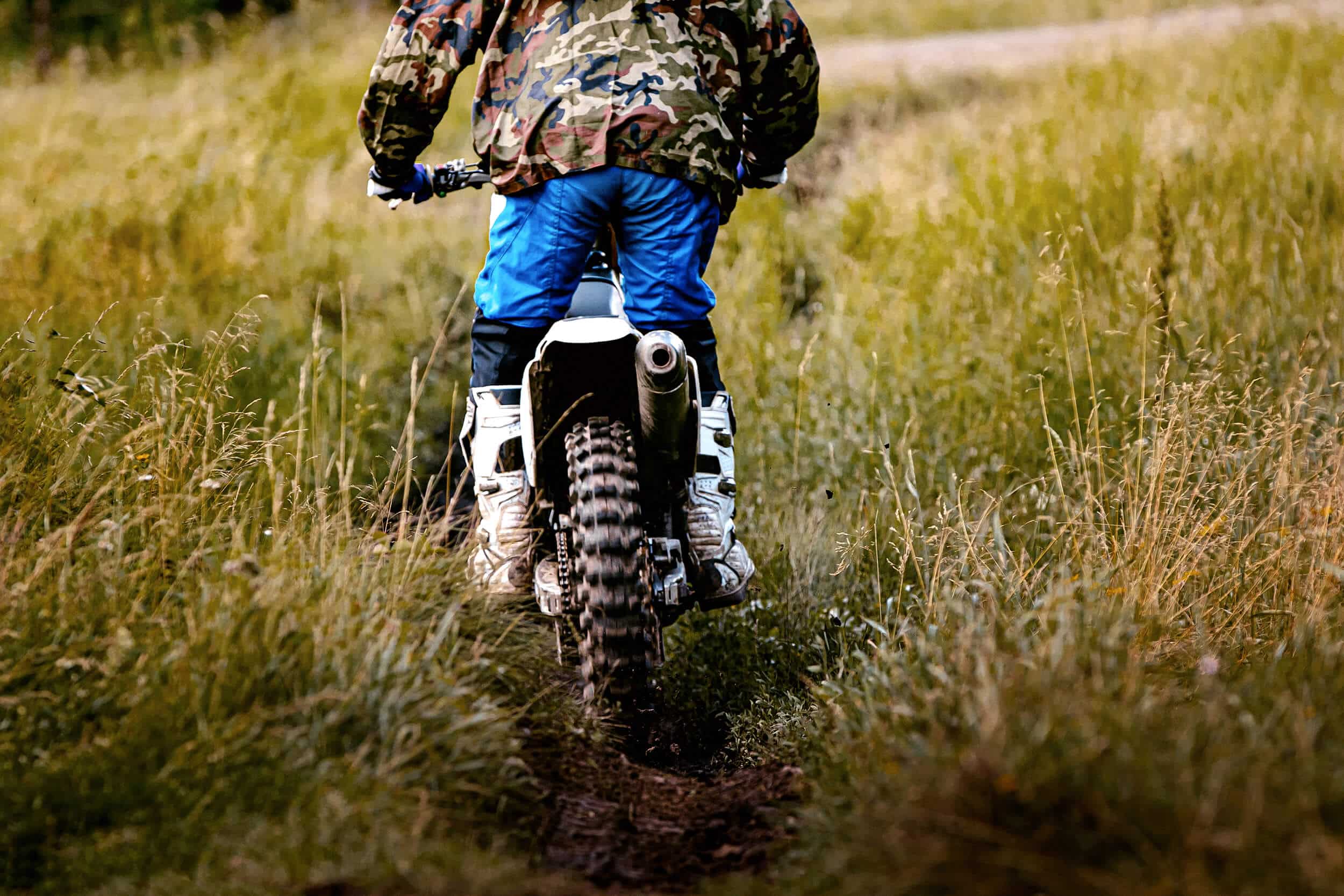 motorbike riding on a forest trail