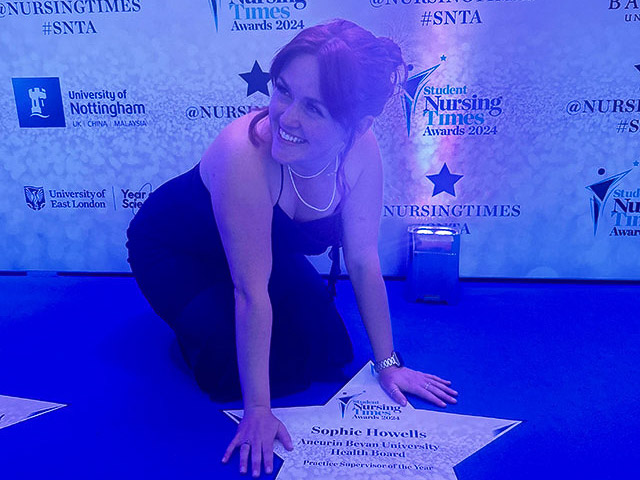 sophie kneeling by a star with her name on it- sophie howells