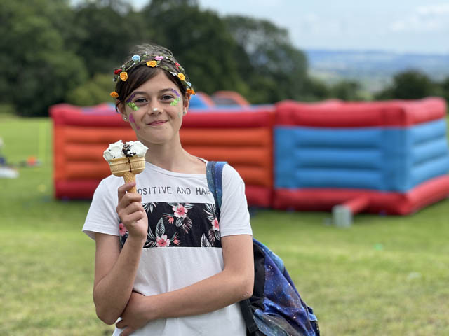 a girl eats an ice cream