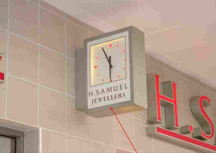 a clock with the name H Samuel jewellers on it