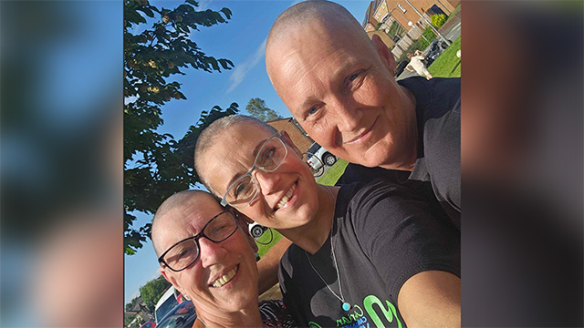 three people who had their heads shaved for charity