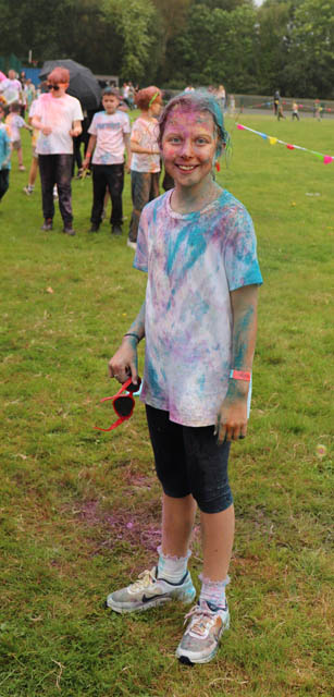 a girl covered in powder paint