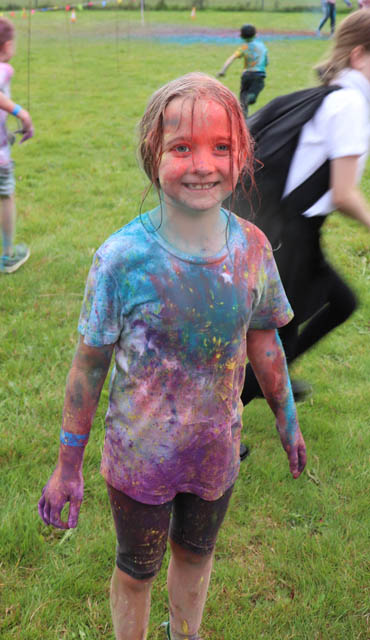 a girl covered in powder paint