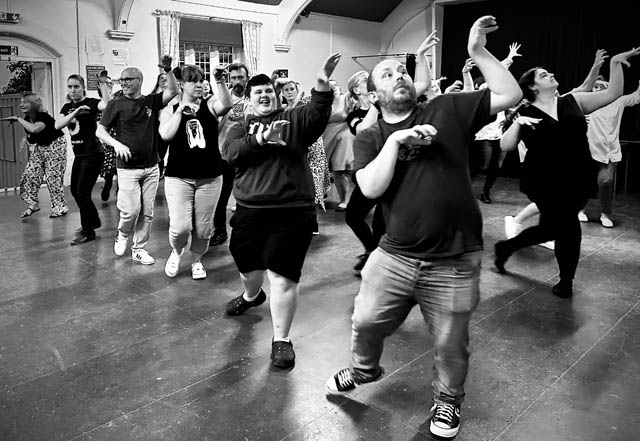 group of actors rehearsing for a show