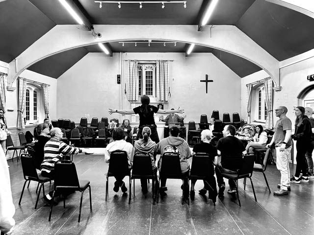 group of actors rehearsing for a show