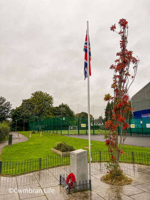 a memorial in a park to fallen soldiers