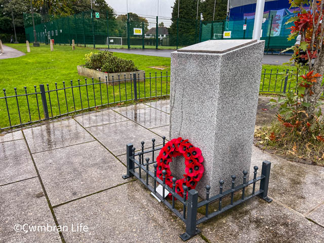 a memorial and poppy wreath