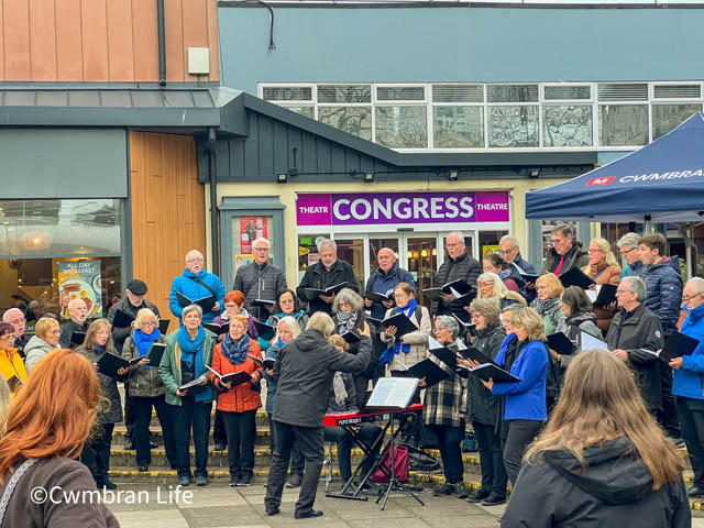 a choir singing outside