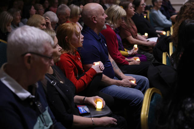 an audience watch a choir