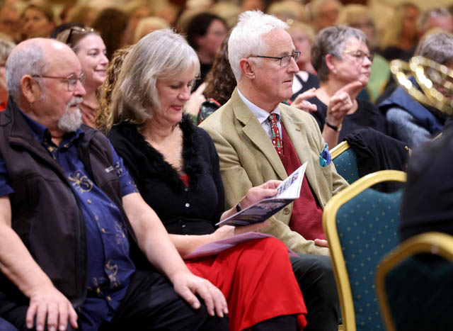 an audience watch a choir