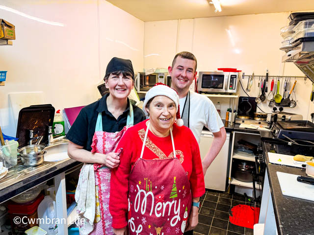 Three members of staff in the kitchen