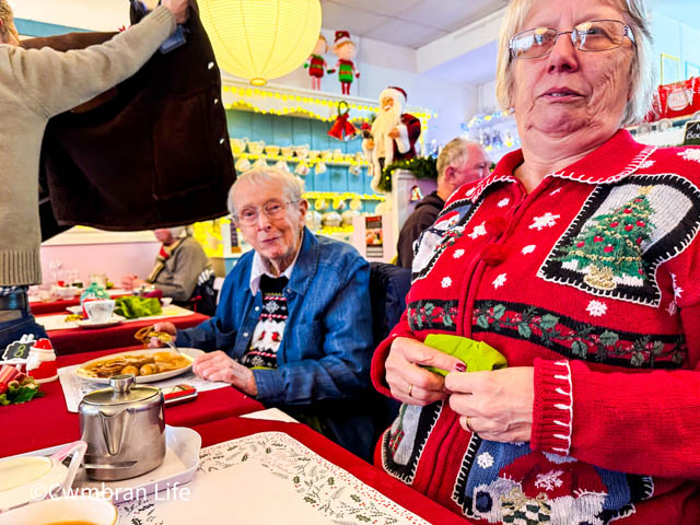 two people at a cafe table