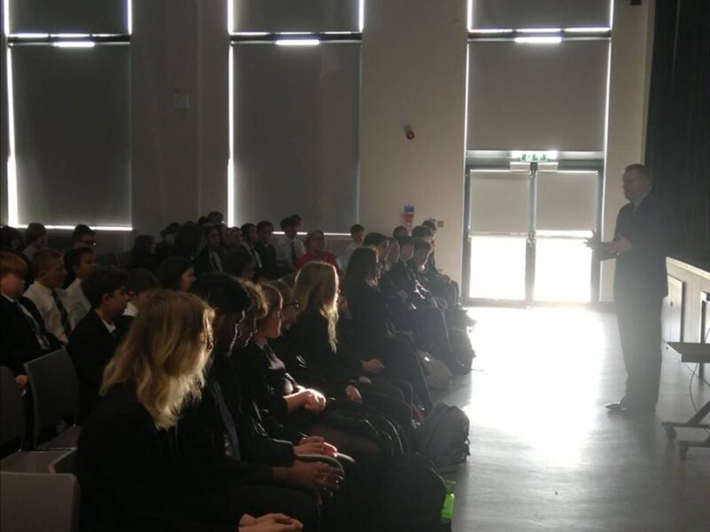 Nick Thomas-Symonds MP talking to a school hall of pupils