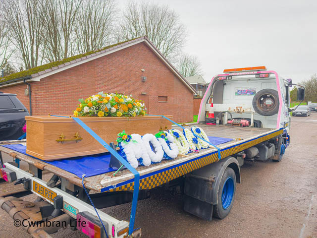 The flatbed lorry carried John Swain to his funeral