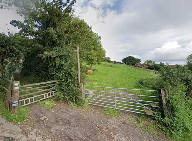 a gate leading to a field