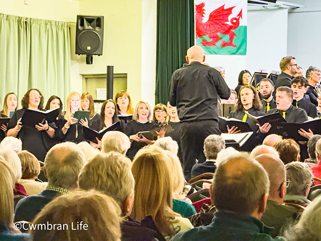 a conductor leading a choir