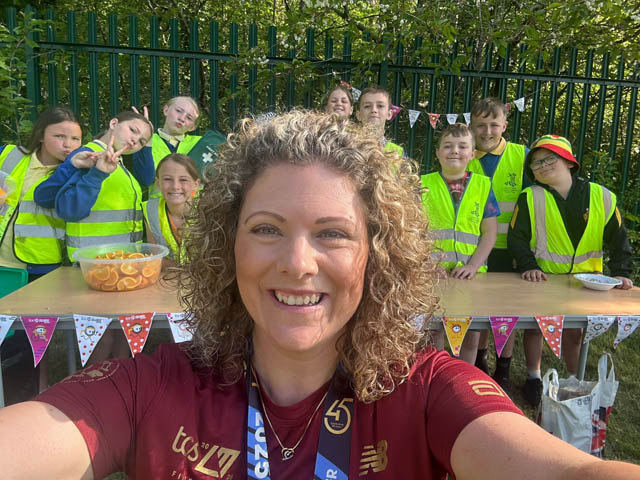 Mrs Maguire at Cwmffrwdoer Primary School with pupils