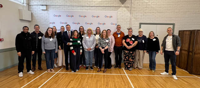 a group of people in a community hall