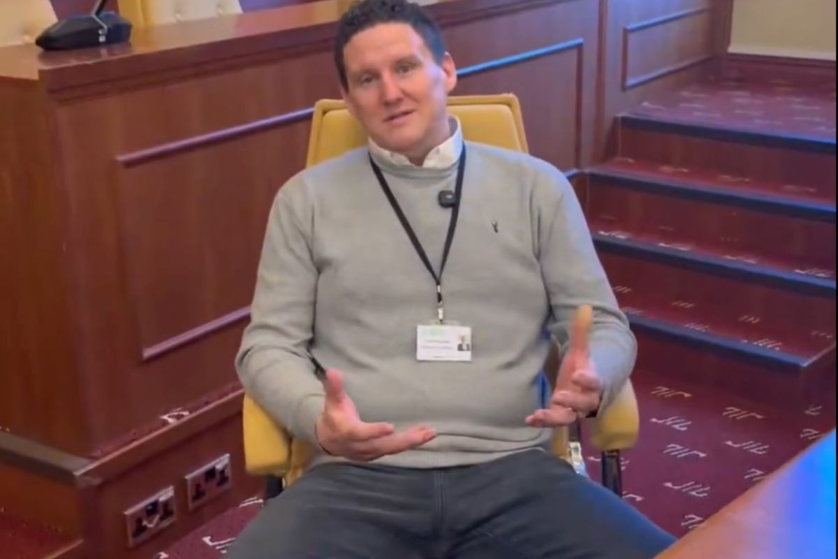 a man sat in a chair