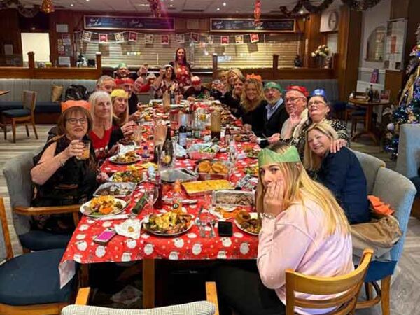 Community Christmas Day dinner in Llanyrafon Social Club