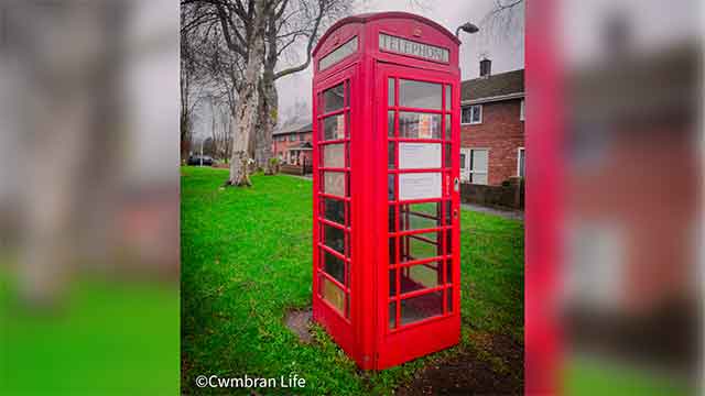 a red BT telephone box