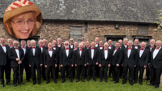 a male voice choir stood outside