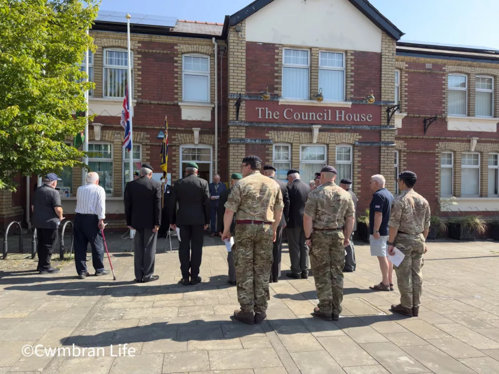 a group of veterans and serving soldier at a service