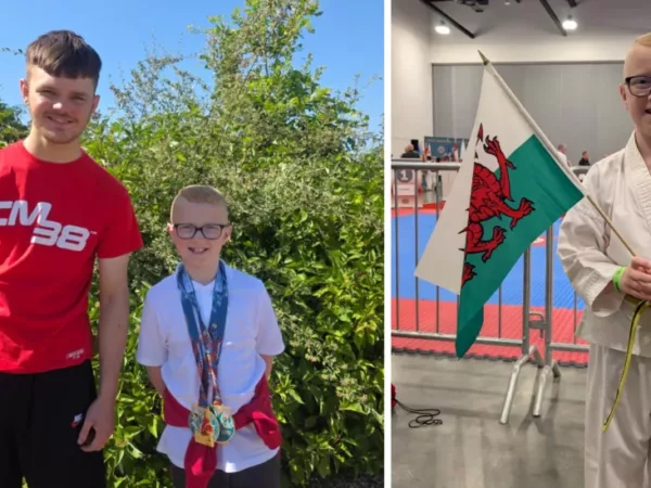 Caleb McDuff gives support to young Taekwondo champion