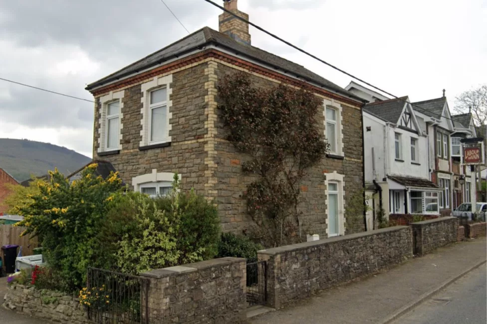 a house with a road running past it