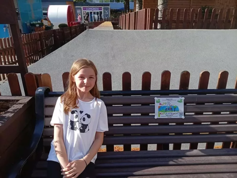 Charlotte Edwards spots her ‘happy to chat’ plaque on a Cwmbran bench