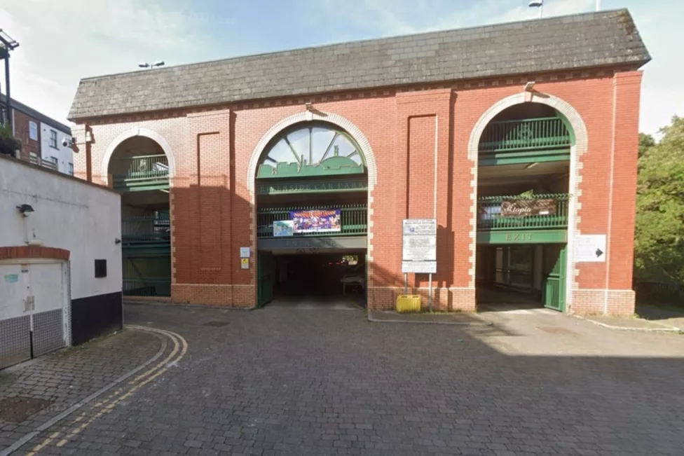 the entrance to a car park