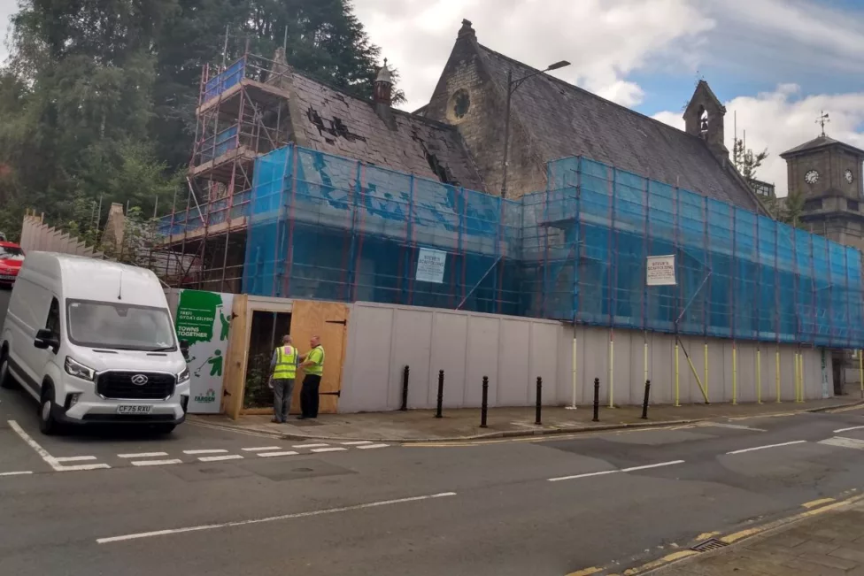 a church with scaffolding on it
